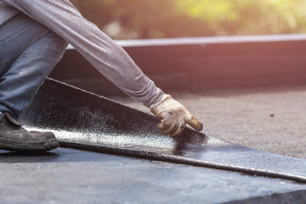 Professional Emergency Waterproofing technician working in Hartland, WI